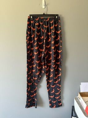 SHEIN Black Joggers with Orange Bat Pattern